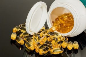 The Nootropic Benefits of Fish Oil 8 Fish oil capsules and bottle